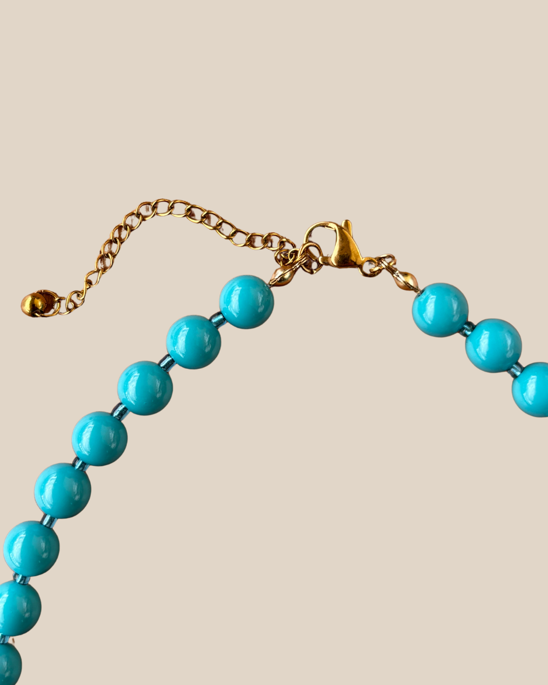 Ave Necklace: Turquesa con Charm de Flor en Stainless Steel